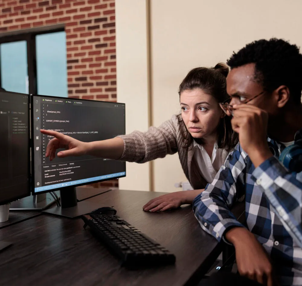 caucasian software developer signaling screen data breach deactivated security system tech engineer observing multiple system security breaches caused by overloaded storage servers Small scaled e1728338743159